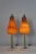 A pair of petite Mezza Murano style lamps. Simple sleek design. Graceful pear shape hand blown glass shades. Mounted on...