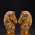 This is a matching pair of elegant ceramic sculptures depicting horse heads, crafted in the traditional Chinese "Sancai"...