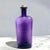 This early 20th-century amethyst glass bottle was produced by the Larkin Company of Buffalo, New York, known for its...