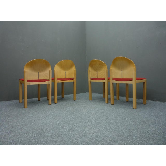 4 very nice postmodern chairs from the 80s. Designed by Arno Votteler. Material: beech wood and seat covered with a robust...
