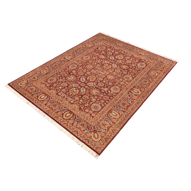 Designed with mesmerizing intricacy and gorgeous color palette, this hand-knotted masterpiece demonstrates the beauty and...