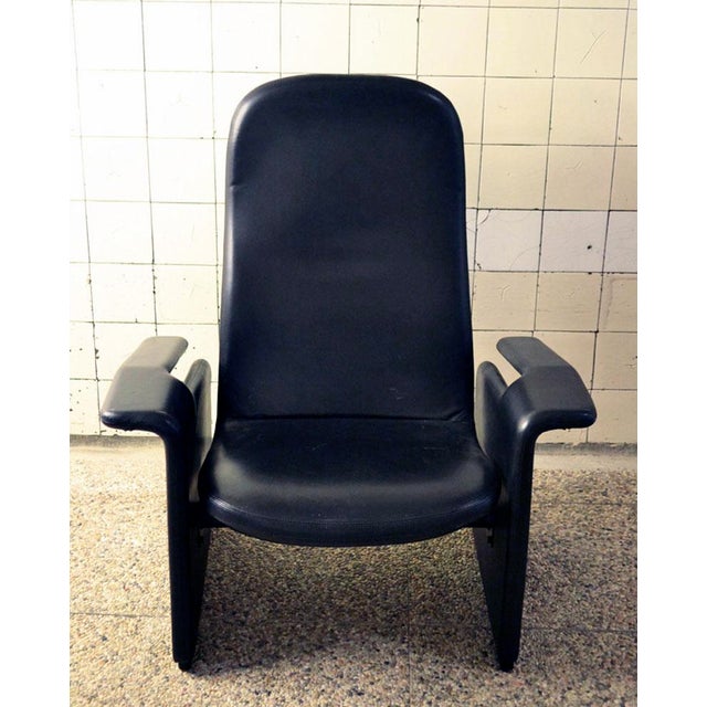 - Armchairs designed by Eugenio Gerli for Tecno in 1968 - Covered in fine full grain leather - Back with a reclining...