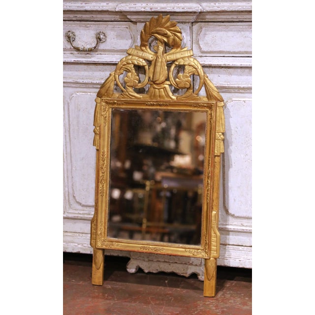 This elegant antique French mirror was crafted in Provence circa 1780 and reflects the refined neoclassical vocabulary of...