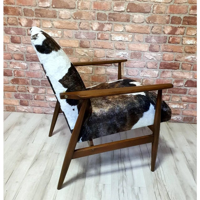 After a comprehensive renovation of wood and upholstery. Replaced belts and a sponge. Upholstery in velour imitating cow...