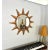 Striking 36" sunburst wall mirror with a sculptural metal frame and warm, aged finish. The rays alternate between sharp...