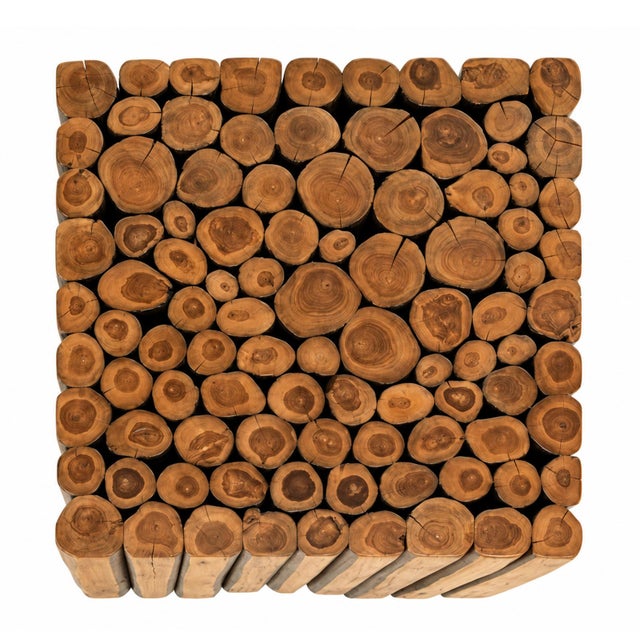 Bring warm rustic-modern character to your space with this impressive coffee table. Crafted from natural logs arranged...