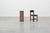 A striking rectangular pedestal crafted from polished red granite, produced in Belgium during the 20th century. Defined by...