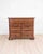 A distinguished early 18th century Lombard chest of drawers, beautifully crafted in solid walnut and rich with the...