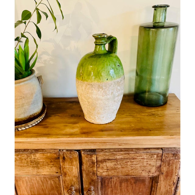 18 century St Onge Oil Bottle Known as a “Bonbonne Saintongeais” This magnificent example of a St Onge oil bottle is truly...