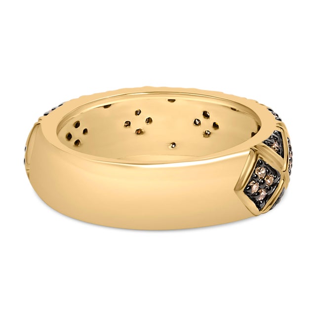 Indulge in the exquisite artistry of this champagne diamond band ring, elegantly crafted in 10K yellow gold-plated .925...