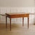 Antique Louis XVI style writing desk, France, circa 1880–1900, with a veneered body, brass fittings, and two side...