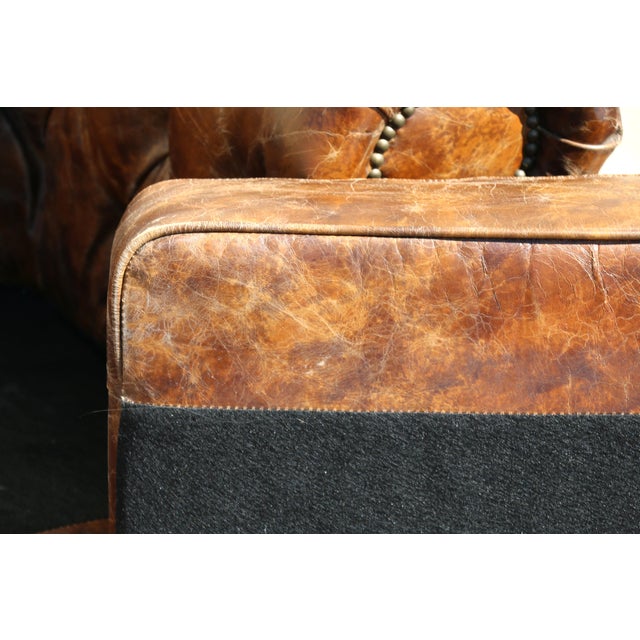 Industrial Distressed Brown Leather Chesterfield Sofa – Three Seat Tufted Sofa With Nailhead Trim & Casters For Sale - Image 16 of 18