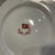 Reproduction of a Titanic white star line dinner plate. White ground with central red flag logo. Back marked rms titanic...