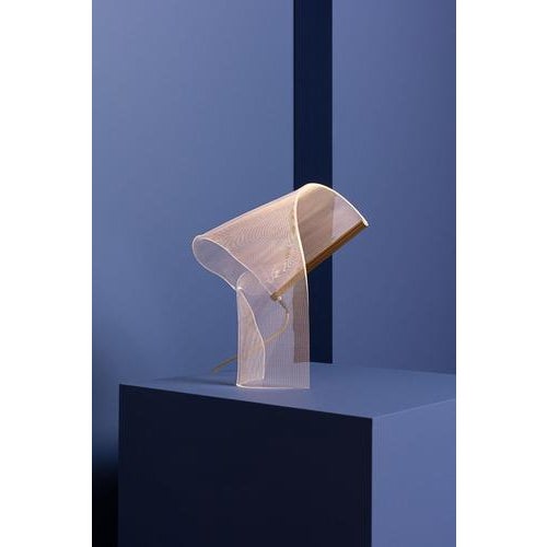 Gweilo song table lamp. Hand-moulded, transparent acrylic structure. Led strip embedded in gold or silver anodized...