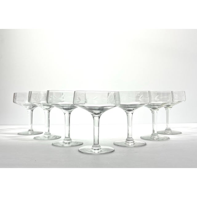 1950s Vintage Set of 7 Coupe Optic Etched Flower Champagne Glasses 4 1/2” 6oz Good vintage condition. No chips, cracks, or...