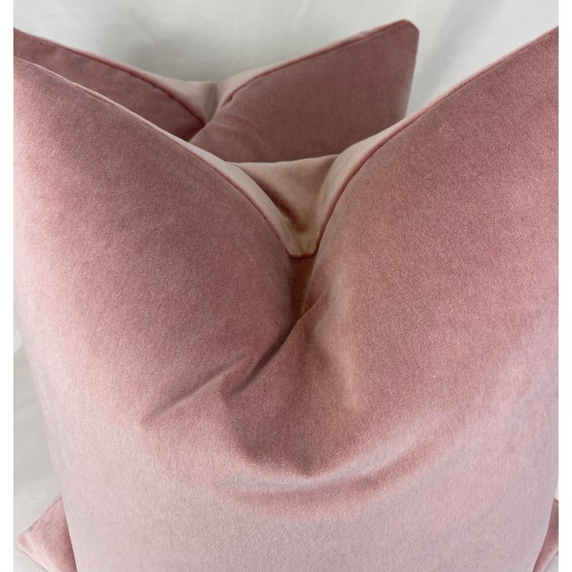 Custom pair of 22” pillows covered in a pink slipper colored velvet. These pillows have tapered corners to prevent dog...