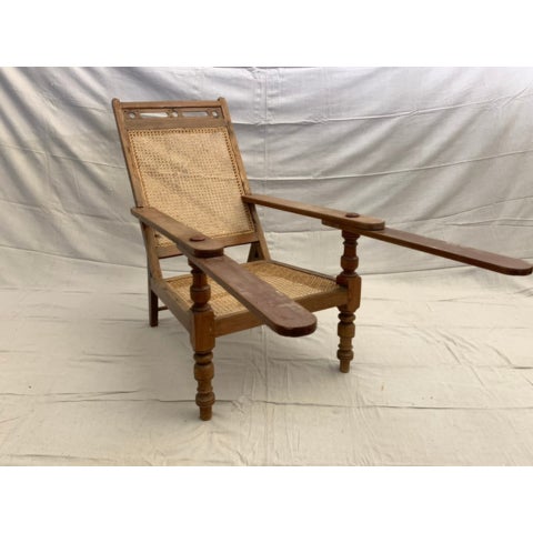 English 19th Century Antique Anglo-Indian Caned Planter's Chair With Extendable Leg Rests For Sale - Image 3 of 5