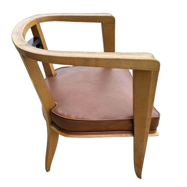 An exceptional example of early 20th-century avant-garde Bauhaus inspired design, this barrel-back armchair showcases...
