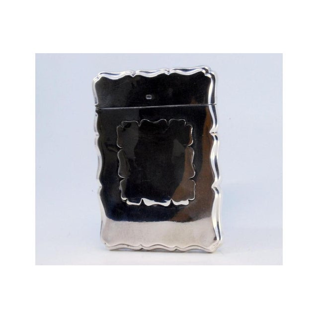 Plain Silver Card Case with Central Monogram Application and Wavy Contours, in Very Good conditions. Designed 1890 to 1919...