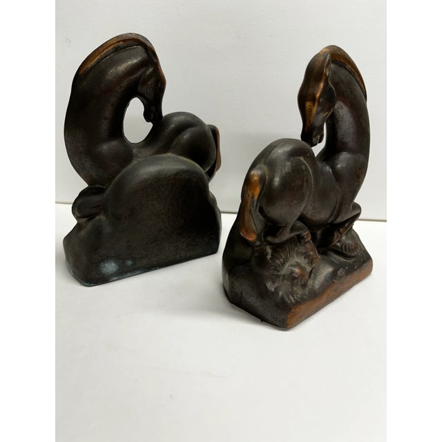 Charming Art Deco copper or bronze horse bookends. Beautiful, lyrical design.