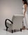 This chair carries genuine presence, its cream/oatmeal boucle upholstery immediately setting the tone for the piece. It...