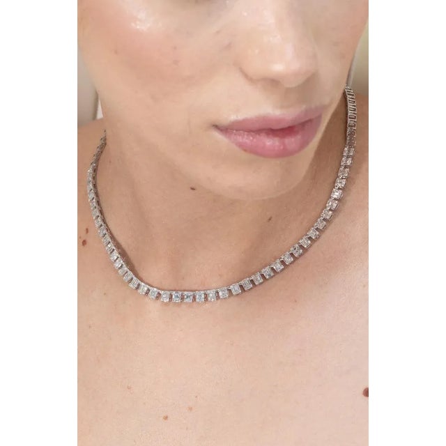 This is part of Chairish’s Fine Jewelry assortment. Emerald Cut Illusion Set Diamond Tennis Necklace studded in 18K Gold....