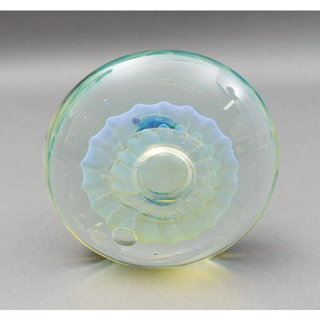 Elin Isaksson United Kingdom 1999 Signed Iridescent Art Glass Paperweight. Measures approximately 5" diameter, 2" high.