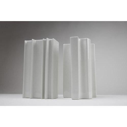 Pair of white glazed ceramic vases, with the manufacturer’s label on the back. Manufactured by fratelli brambilla. Date:...