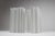 Pair of white glazed ceramic vases, with the manufacturer’s label on the back. Manufactured by fratelli brambilla. Date:...