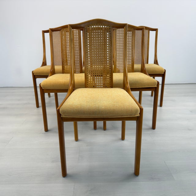 Dimensions: H 37.3” x W 18.5” x D 22” x SH 19” Set of 6 Mid-Century Modern Danish cane back dining chairs. Upholstered...