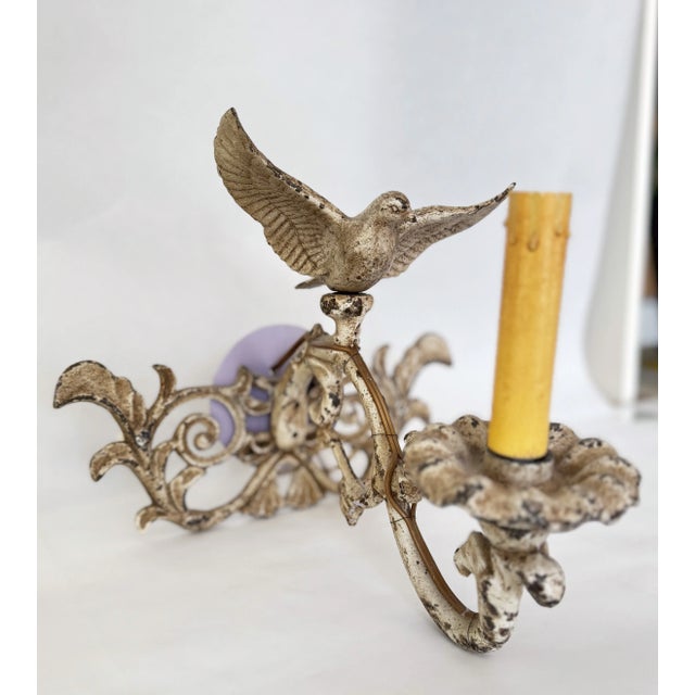 Pair of stunning cast iron painted bird sconces (3 pairs available and sold on separate listings). Acquired from an estate...