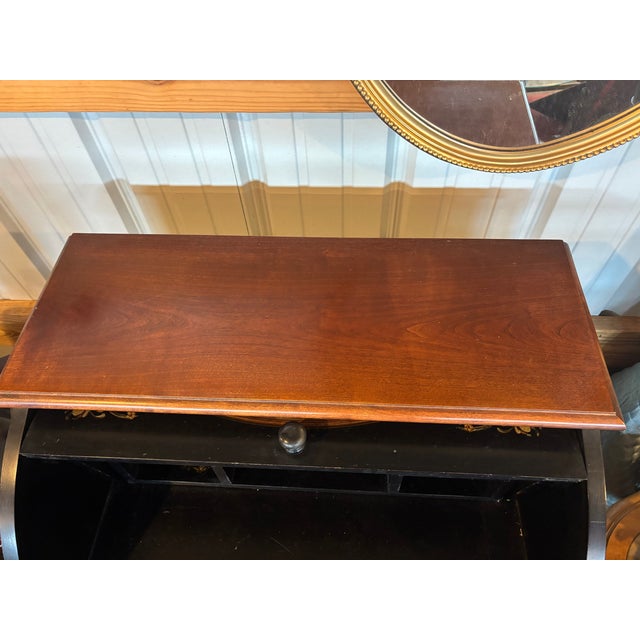 Charming roll top desk embellished with a country scene featuring a hand painted scene of a horse drawn carriage with a...