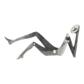 Eichengreen & Ginsburg Articulated Poslished Aluminum Woman Sculpture For Sale