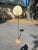 Organic modern floor lamp with an unusual use of materials. The fan shaped shade is made of a dried palm frond. The pole...