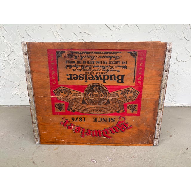 This authentic vintage Budweiser wooden beer crate features original factory stenciling and lithographed graphics,...