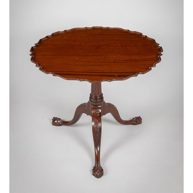 Fine 18th Century George III Chippendale mahogany pie crust tilt-top tripod pedestal side or center table with fluted...