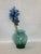 A mid-century modern Bottle Green Blown Glass Vase is a vintage piece from the Mid 20th Century. Single family owned since...
