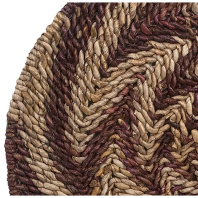 Beautiful hand woven Abaca basket flat round wall art from Indonesia. Striking two-toned pattern in brown stained and...