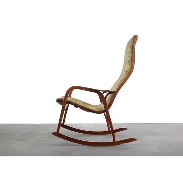 Ekströms Lamino chair, designed 1956, is one of the most comfortable chairs and a timeless sculptural Scandinavian design...
