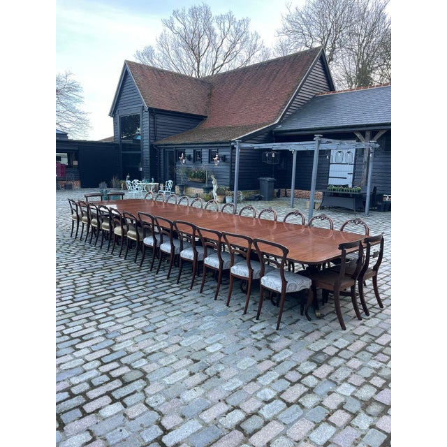 Rare 28 seater 6 pilar antique George III quality mahogany dining table having a large quality figured mahogany top...