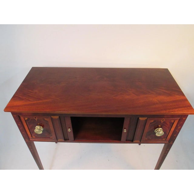 Beautiful Baker Historic Charleston hunt board. This pieces is made of mahogany with delightful leaf inlays solid brass...