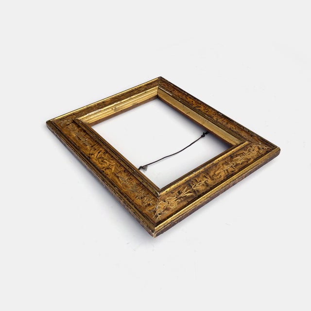 This antique gold frame with hand painted and carved faux marble panels. is in good shabby chic condition as pictured....
