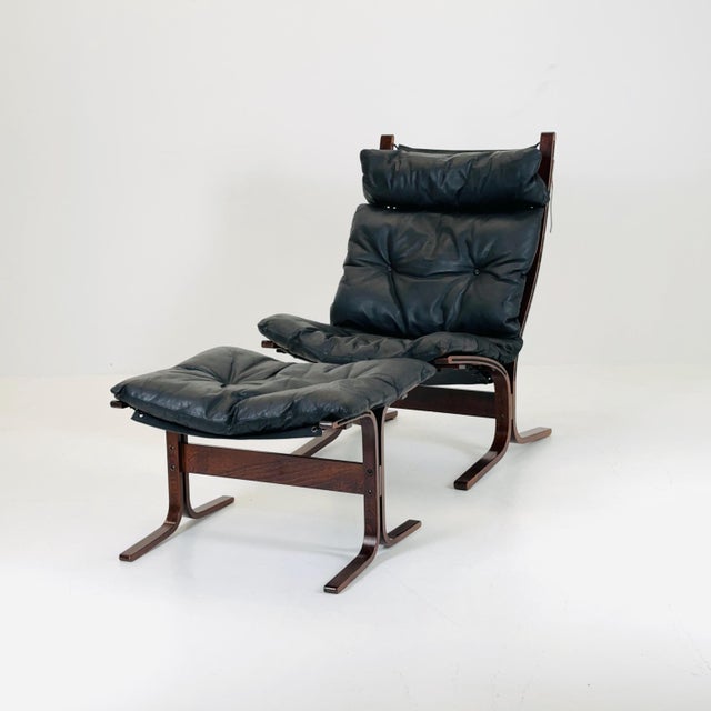 Mid century armchair “Siesta” and its ottoman by Ingmar Relling, Westnofa Furniture, Norway. Designed by Norwegian...
