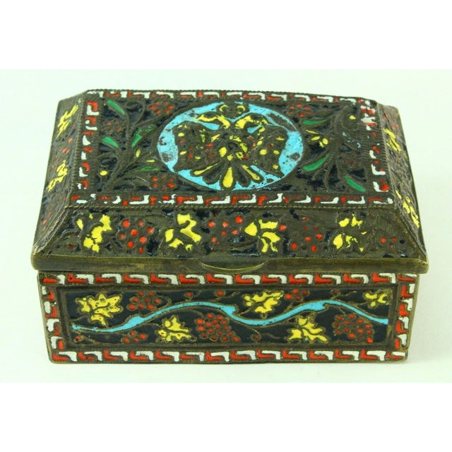 An outstanding antique box, made of thick bronze with intricate celled enamel ornamentation Displays the Double-Headed...