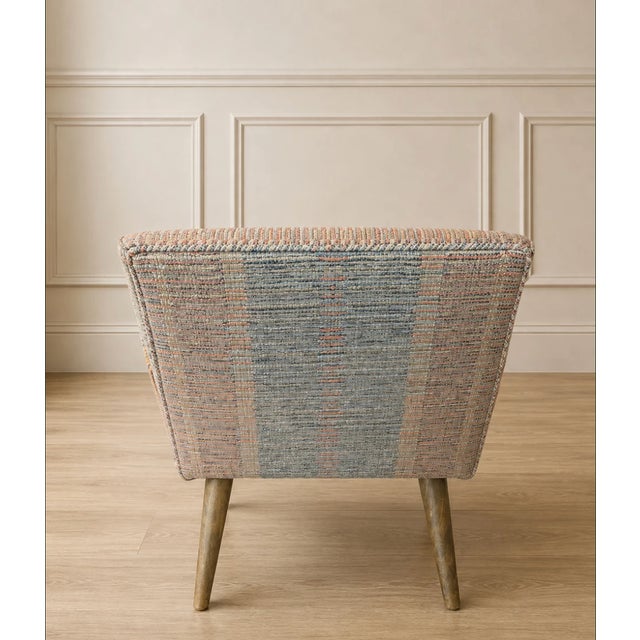 A stylish upholstered bench featuring softly sculpted, raised sides and a tufted seat in a warm woven fabric of muted...