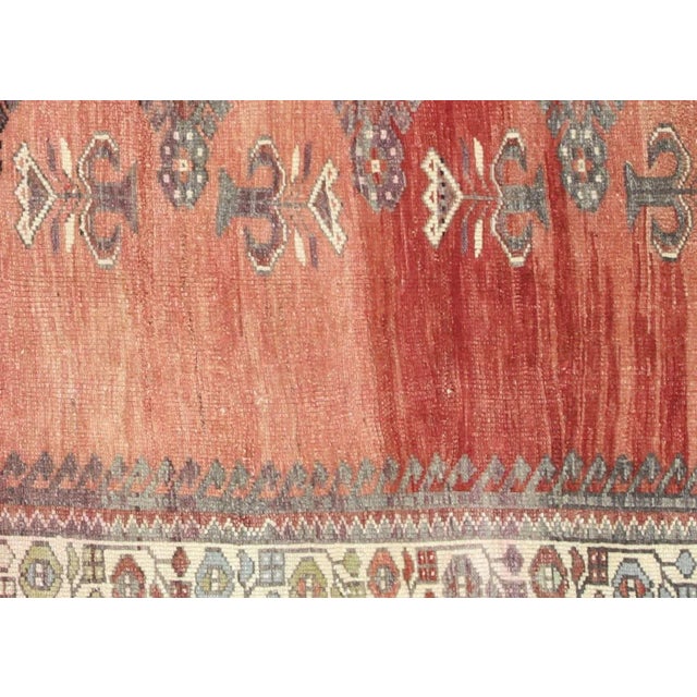 1960s Turkish Oushak Rug. Handwoven with wool on wool foundation in the Oushak region of Western Turkey. The Anatolian...