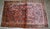 Handmade antique Persian Sarouk rug in original good condition. The rug is from the beginning of 20th century made in pink...