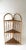 A wicker bamboo corner wall or floor shelf etagere. Piece has three (3) storage shelves with crisscross latticework style...