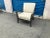 Mid century lounge chair done in an exotic finish . The finish is a matte gray finish. The fabric is a taupe leather. The...