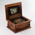 Polyphon music box 19th century, in a wooden case with singing birds marquetry in the frame panel, corner balusters and...